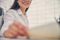 Close up of brunette woman that taking paper Royalty Free Stock Photo