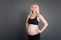 Positive delighted pregnant woman in the gym Royalty Free Stock Photo