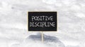Positive discipline symbol. Concept words Positive discipline on beautiful black chalk blackboard. Chalkboard. Beautiful snow