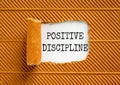 Positive discipline symbol. Concept words Positive discipline on beautiful white paper. Beautiful brown paper background. Business