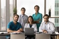 Positive diverse team of attractive young practitioners, surgeons Royalty Free Stock Photo