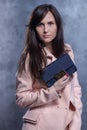 Positive emotional portrait of young and pretty girl with bag. B Royalty Free Stock Photo