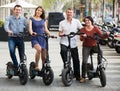 Positive family of four with electrkc bikes