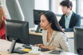 Positive Female Customer Services Agent With Headset Working In A Call Center Royalty Free Stock Photo