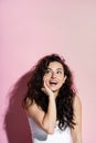 Positive freckled woman in top looking