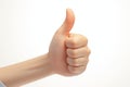 Positive gesture womans hand shows thumbs up sign