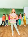 Positive girl stands near blackboard with numbers Royalty Free Stock Photo