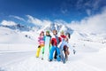 Positive group of 5 snowboarders Royalty Free Stock Photo