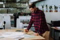 Cheerful bearded man working in the office Royalty Free Stock Photo