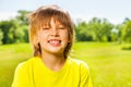 Positive happy smiling kid in yellow T-shirt Royalty Free Stock Photo