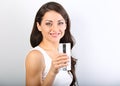 Positive happy woman with healthy skin and long curly hair drink Royalty Free Stock Photo