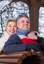 Mature couple on park bench