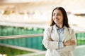 Positive inspired confident millennial lady in suit enjoy work in city outdoors Royalty Free Stock Photo