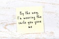 Positive inspiring quote handwritten on sticky note on wooden background Royalty Free Stock Photo