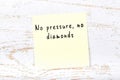 Positive inspiring quote handwritten on sticky note on wooden background