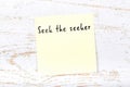 Positive inspiring quote handwritten on sticky note on wooden background Royalty Free Stock Photo