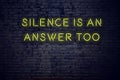 Positive inspiring quote on neon sign against brick wall silence is an answer too