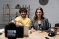 positive interracial podcasters in yellow jumper Royalty Free Stock Photo
