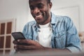 Positive joyful man typing a message Royalty Free Stock Photo