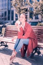 Positive joyful young ballerina enjoying a hamburger Royalty Free Stock Photo