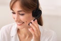 Positive Lady In Headset Working In Call Center, White Background Royalty Free Stock Photo