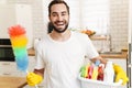 Positive man househusband indoors Royalty Free Stock Photo