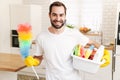 Positive man househusband indoors Royalty Free Stock Photo