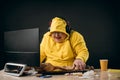 Positive man laughing at something while sitting in front of the computer Royalty Free Stock Photo