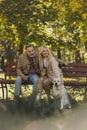 Positive mature couple holding takeaway coffee Royalty Free Stock Photo