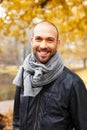 Positive middle-aged man on autumn day Royalty Free Stock Photo