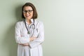 Positive middle-aged woman doctor Royalty Free Stock Photo