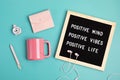 Positive mind, vibes, life motivational quote on the letter board. Inspiration text