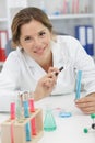 positive minded woman smiling in lab Royalty Free Stock Photo