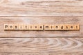 Positive mindset word written on wood block. positive mindset text on wooden table for your desing, concept Royalty Free Stock Photo