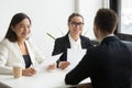 Positive hr executives laughing at job interview with successful Royalty Free Stock Photo