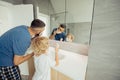 Positive nice father and son shaving together Royalty Free Stock Photo