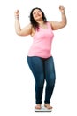 Positive overweight girl on diet scale.