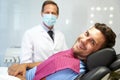 Positive patient and his doctor in dentist office