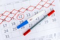 Positive pregnancy test with circling date in calendar. Planning of pregnancy, trying to have baby