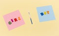 A positive pregnancy test strip, a pink and blue piece of paper with the words `boy` and `girl`on it Royalty Free Stock Photo