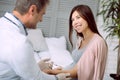 Positive pregnant woman receiving a vaccination