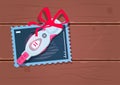 Positive Prenancy Test With Red Ribbon Bow On Wooden Texture Background