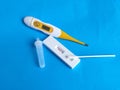 positive result virus Covid-19 rapid fast test sars-cov-2 antigen saliva slobber thermometer Royalty Free Stock Photo