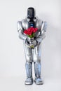 Positive robot holding flowers