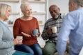 Positive senior people having group therapy with psychologist Royalty Free Stock Photo