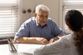 Positive senior 80s patient consulting doctor at appointment Royalty Free Stock Photo