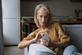 Positive senior smartphone user woman browsing internet
