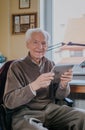 Positive Senior using Digital Tablet Royalty Free Stock Photo