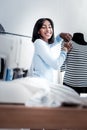 Positive skillful woman looking at the table