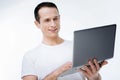 Positive smart man looking at the laptop screen Royalty Free Stock Photo